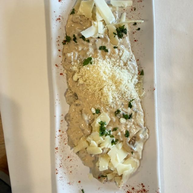 Racó port Rissotto de ceps amb encenalls de parmesà Racó port Rissotto de ceps amb encenalls de parmesà