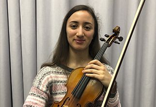 Violí solista Julia Ann Dubuclet