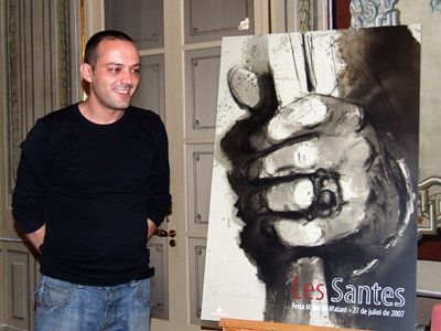 Marc Prat amb el cartell
